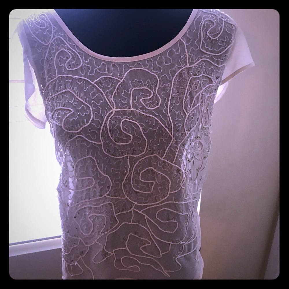 Intricate beaded cream colored top